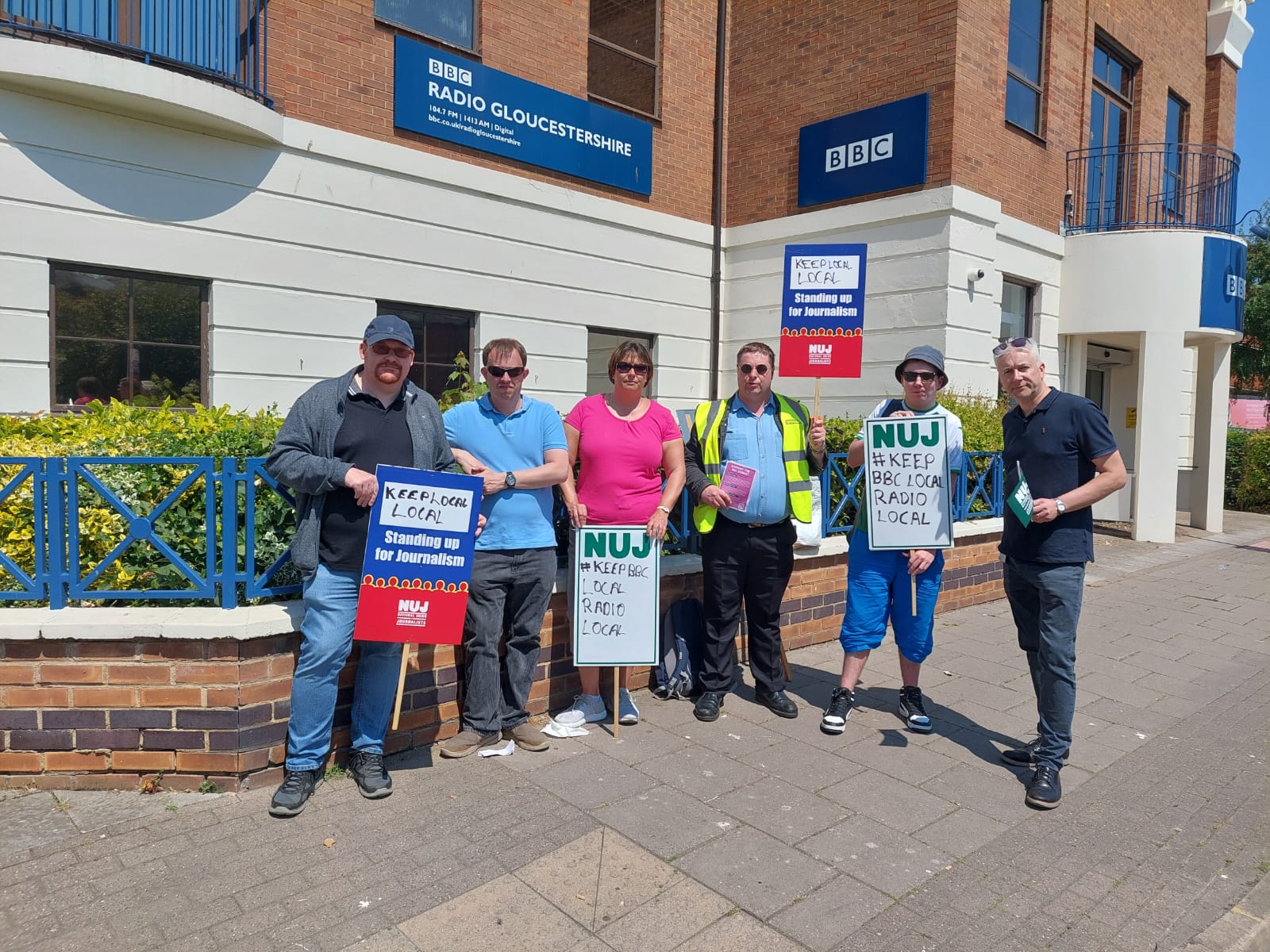 NUJ picket line at BBC Gloucestershire people with placards
