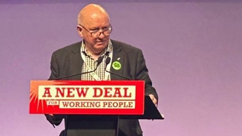 Seamus Dooley at the podium of the TUC Congress