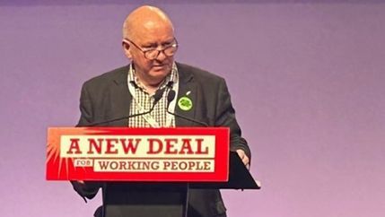 Seamus Dooley at the podium of the TUC Congress